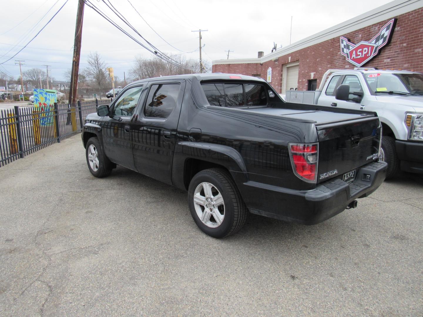 2012 BLACK /Gray Honda Ridgeline RTL (5FPYK1F56CB) , Automatic transmission, located at 215 Milton St, Dedham, MA, 02026, (781) 329-5144, 42.241905, -71.157295 - This nice Ridgeline is in excellent condition. Runs like new. All ASPI Motor Cars vehicles are fully serviced before they are delivered to assure the highest quality used vehicles. Comes with a 3/3 warranty included in the price. call for details. Prices on all vehicles do not include $299.95 Doc - Photo#2